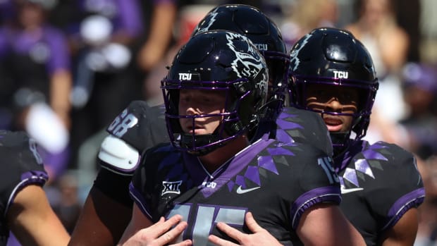 Oct 1, 2022; Fort Worth, Texas, USA; TCU Horned Frogs quarterback Max Duggan (15) celebrates after scoring a touchdown during the second half against the Oklahoma Sooners at Amon G. Carter Stadium. Mandatory Credit: Kevin Jairaj-USA TODAY Sports